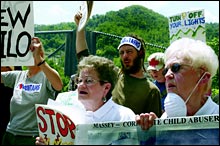 Activists protest peacefully outside a coal-processing plant in West Virginia.