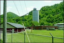 A coal silo looms behind Marsh Fork Elementary School.