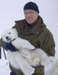 Jeff Corwin with polar bear cub
