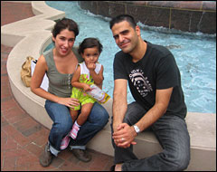 Sarah and  Peter Shojaie and their daughter