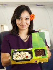 flight attendant with eco-meal