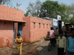 Public toilets in the developing world are fairly uncommon. Those that are available often fall into disrepair and disuse. Above, one of the glitzier example of public plumbing in the slums of Delhi, India.