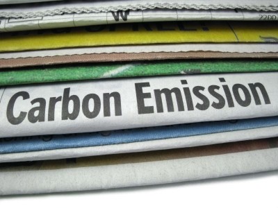 newspaper with "carbon emission" headline