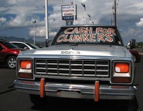 Old truck with "cash for clunkers" painted on windshield