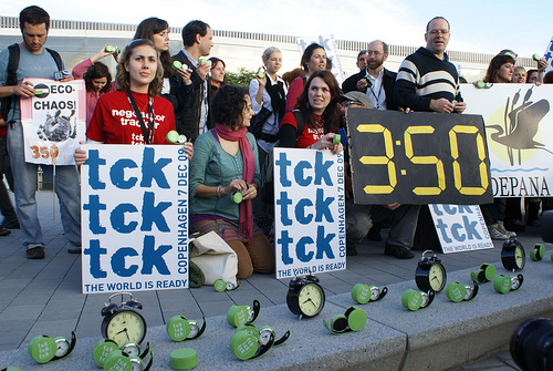 protestors with clocks