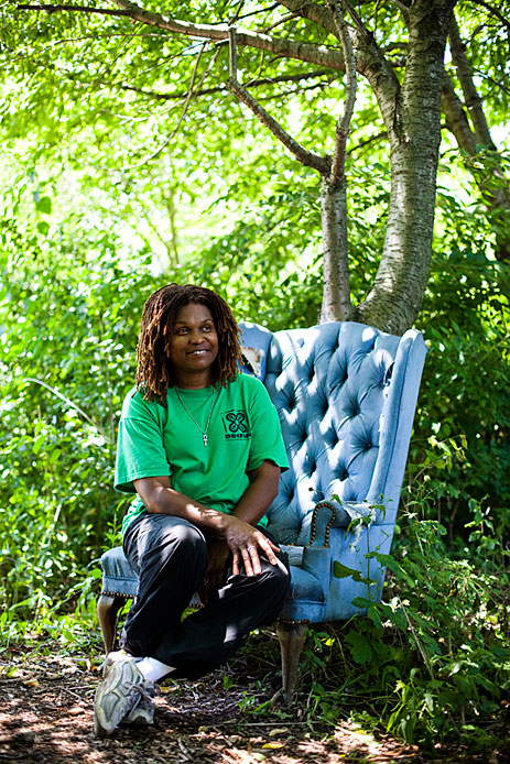Woman in chair under tree