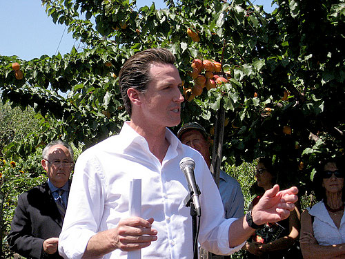 Mayor Gavin Newsom in front of trees