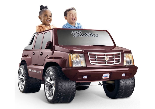 Kids in a Cadillac Escalade Power Wheels