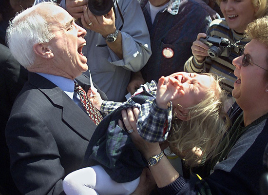 John McCain prepares to eat a child