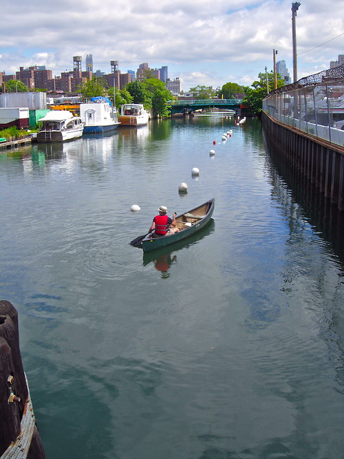 Paddling a canoe on the Gowanus Canal.