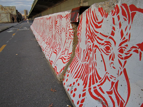 Art on Jersey barriers in Brooklyn.