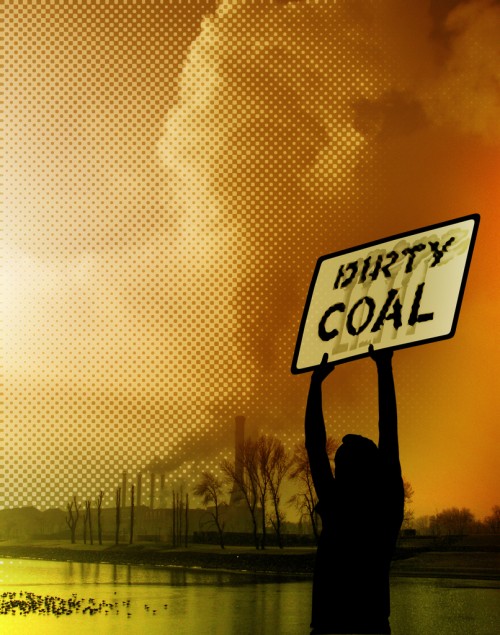 woman holding "dirty coal" sign