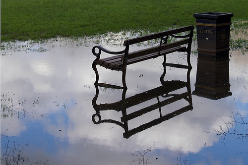 Bench in a puddle.