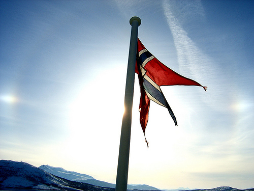 Norwegian flag in sun.