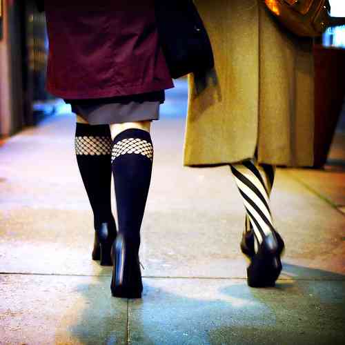 Two women with cool stockings.