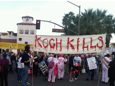 protest sign at anti-koch march in Palm Springs