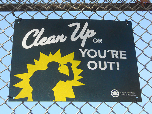 Clean up or you're out sign.