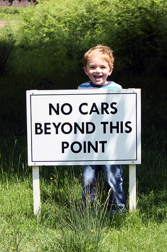 Kid with no car sign
