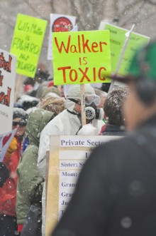 protest sign: "Walker is toxic"
