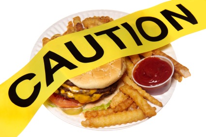 Caution tape over burger.