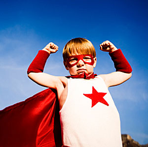 small kid in superhero suit