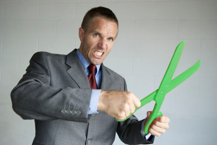 angry man with green scissors
