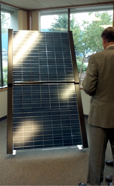 Jay Inslee with solar panel.