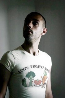 man with "100% vegetarian" T-shirt
