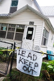house with "lead keep out" sign