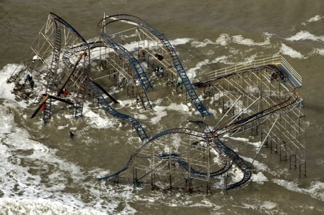 A roller coaster sits in the surf after Hurricane Sandy destroyed the boardwalk and pier in Seaside Park, New Jersey October 31, 2012.