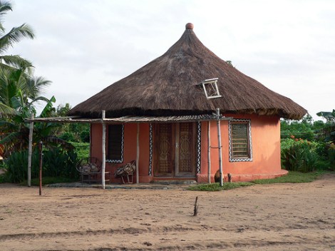 This house in western Ghana has a small solar panel on its roof (the white rectangle).