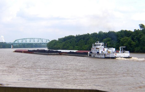 A barge carries environmentally-friendly coal up the Ohio River
