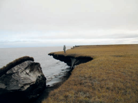 Near Alaska, a chunk of permafrost breaks off into the Arctic Ocean