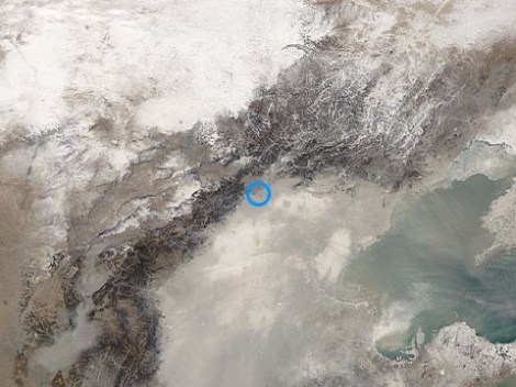 Smog covering Beijing (blue circle) on Saturday …