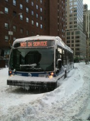 A New York City bus, stuck during a 2010 blizzard