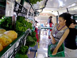 The Fresh Moves buses bring locally grown produce to city neighborhoods.