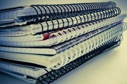 stack-of-spiral-notebooks