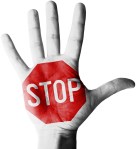 stop sign on a hand