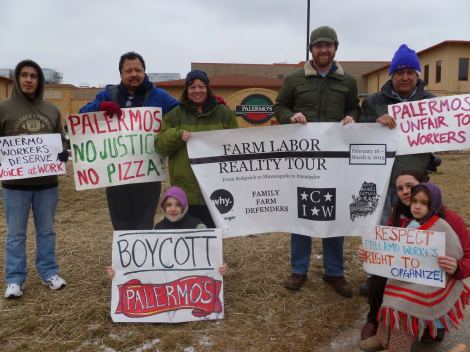 Bob St. Peter (second from left) and his family joined striking Palermo’s Pizza workers on a picket line in Milwaukee in the first week of the Farm Labor Reality Tour. 