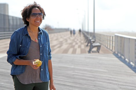 Robyn Hillman-Harrigan on a rebuilt section of the Rockaway Beach boardwalk.