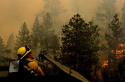 A firefighter at the scene of Colorado's High Park fire in 2012.