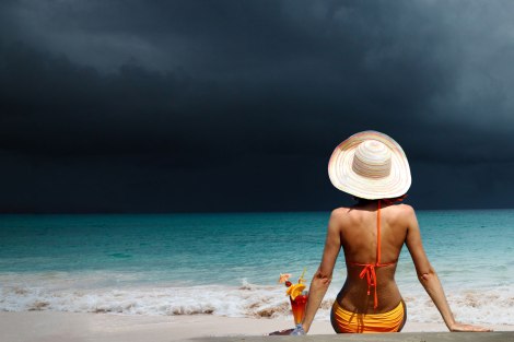 woman-beach-cocktail-ocean-storm-hurricane-small