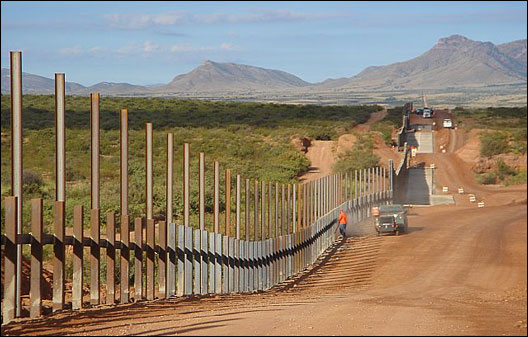 The border fence under construction in Arizona.