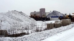 Petcoke pile covered with snow