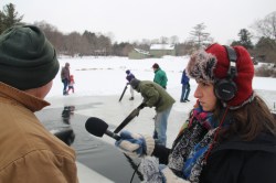 Holtzman conducting an interview at an ice harvesting demonstration at the White Memorial Conservation Center in Litchfield, Conn.