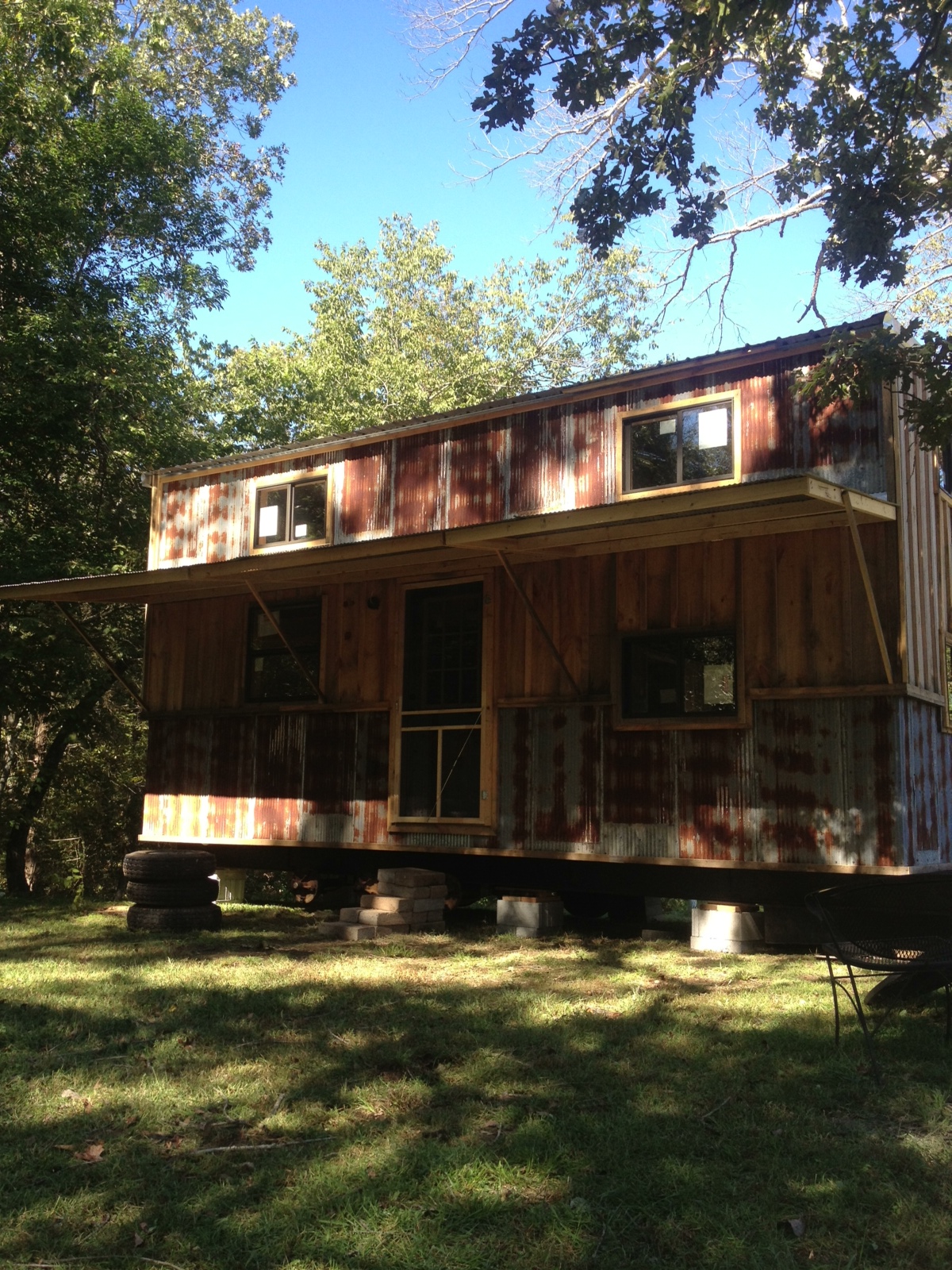 Cherae Stone's 240 square-foot house, made of Arkansas pine and corrugated tin, took just six months to construct.