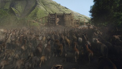 Animals herd onto the Ark in Noah.