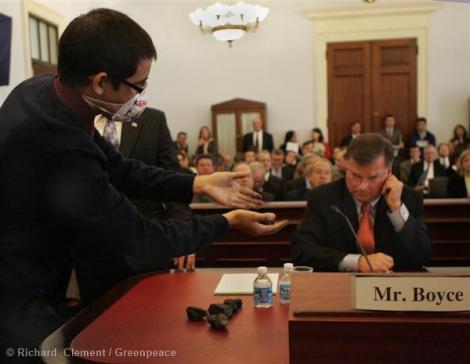 Young people confront Peabody CEO Greg Boyce at a congressional hearing in 2010
