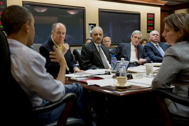 Holder attending a presidential meeting