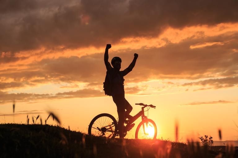 Bicyclist at sunset